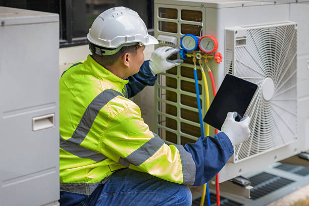Professional Hvac technician working in Dighton, MA